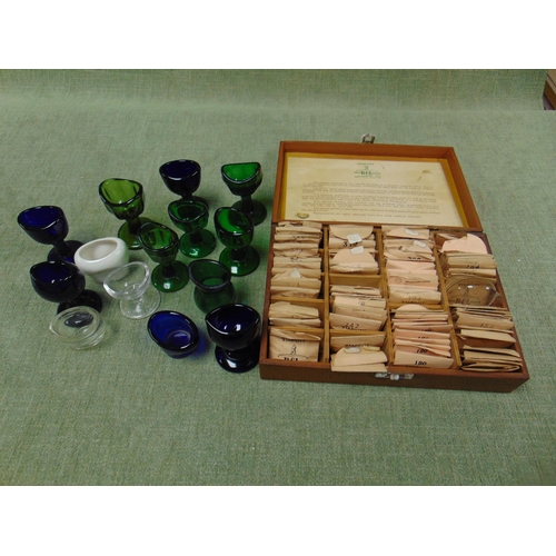 189 - Quantity of antique glass eye baths, together with a case of lenses.