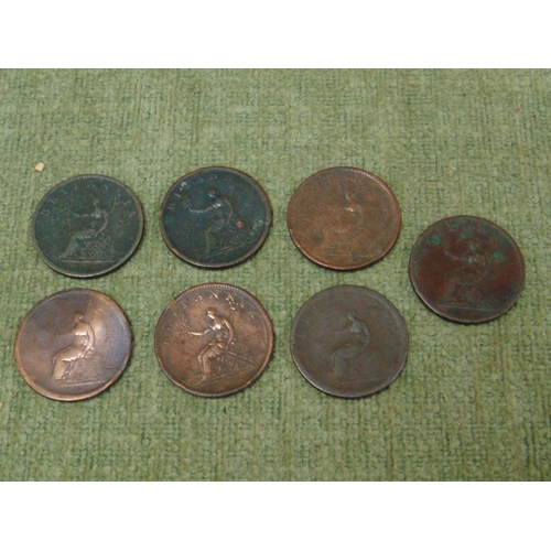 212 - Seven George III 1806/7 half penny coins.