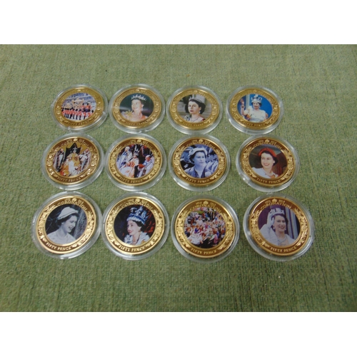 222 - Cased set of commemorative coins,  Coronation, Jubilee and one other.