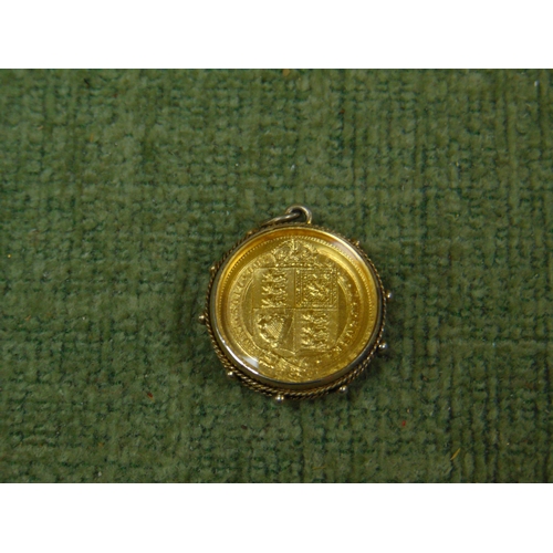 233 - Victoria 1887 shield back half sovereign, in mount.