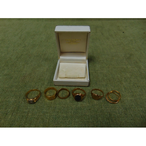 240 - 9ct gold seal ring, 9ct gold wedding band, 22 ct gold ring, gold ring set with green stones, and two... 