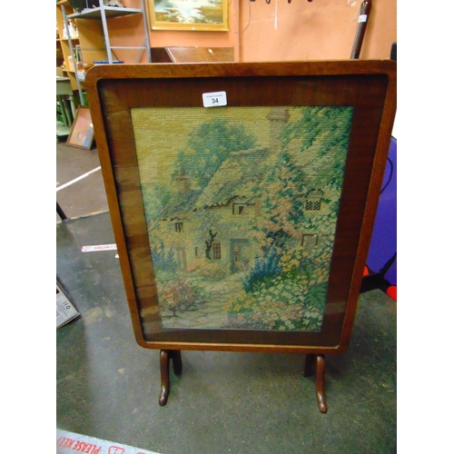 34 - Metamorphic glazed needle work centre table/ fire screen.