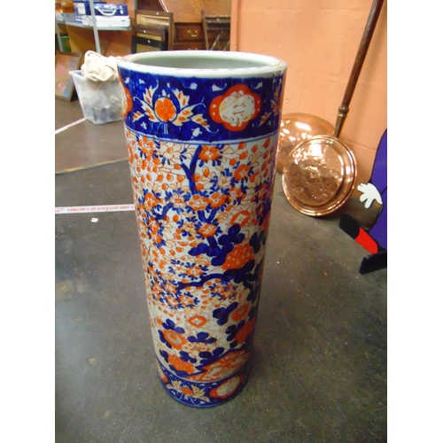 35 - Antique Imari stick stand, of cylindrical form, (af). 25