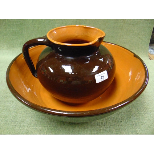 42 - C.H Brannam Devon, treacle glazed jug and bowl set.