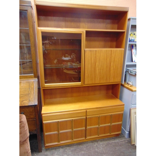 516 - Mid century teak dining suite, comprising extending table, six chairs and a lounge fitment.