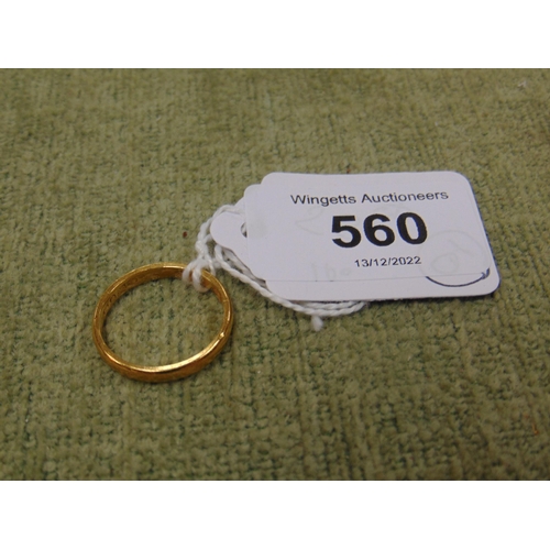 560 - 22 ct gold wedding band, size P , 3.9 gms.