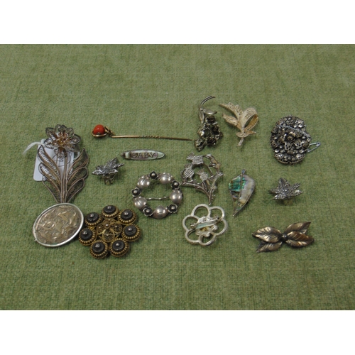 567 - Various Marcisite and other broaches.