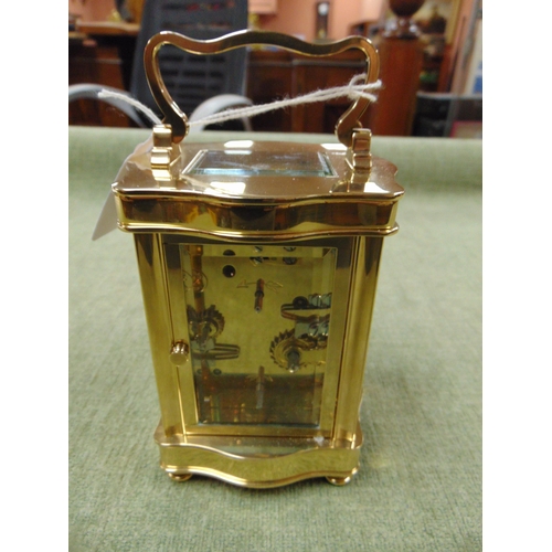 588 - Reproduction French carriage clock, having Roman numerals. 7