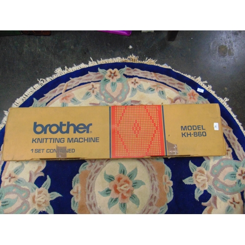 91 - Boxed Brother KR -850 knitting machine, and a boxed ribbing attachement.