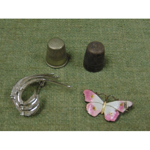 464 - Art deco silver brooch, silver gilt butterfly brooch and two plated thimbles.