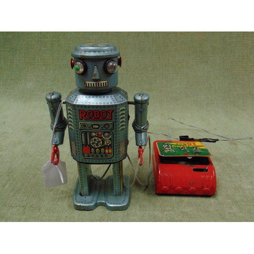 105 - Retro battery operated robot.