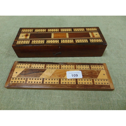 109 - Games box / cribbage board and one other board (2).