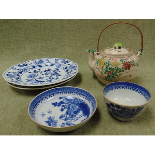 110 - An oriental tea pot, pair of blue and white dishes and a willow pattern tea bowl and cup.