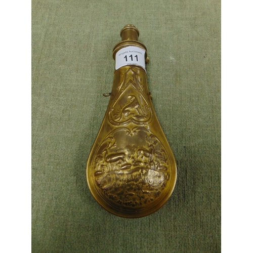 111 - Reproduction brass powder flask, having embossed decoration.