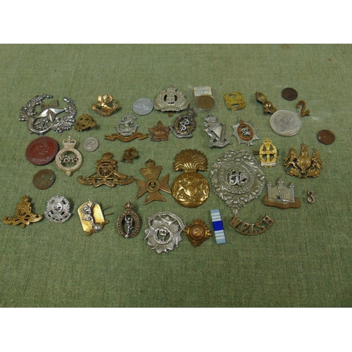 116 - Interesting collection of military crested badges.