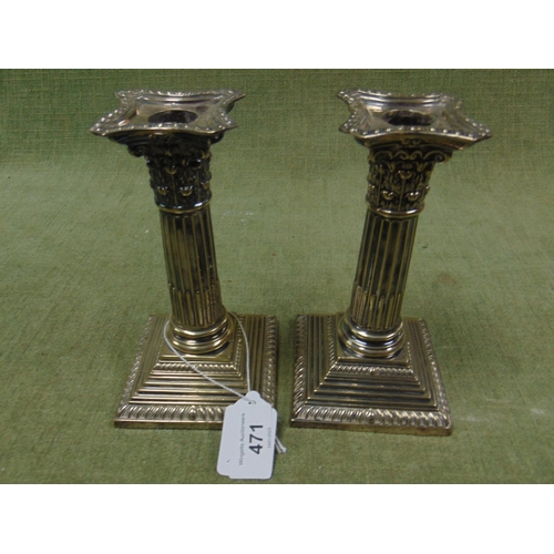 471 - Pair of good quality plated corinthian column form candle sticks. Each 6