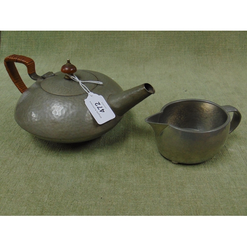 472 - Tudric pewter - Liberty & Co milk jug together with a Tudric teapot. (2)