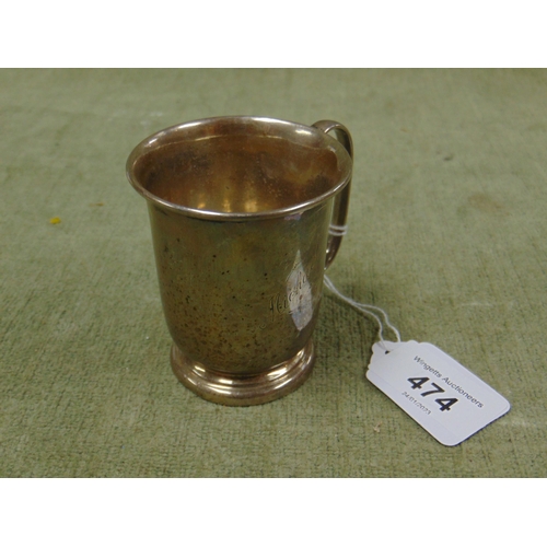 474 - Silver christening mug, having loop handle and on footed base, maker Viners Ltd, 1935.