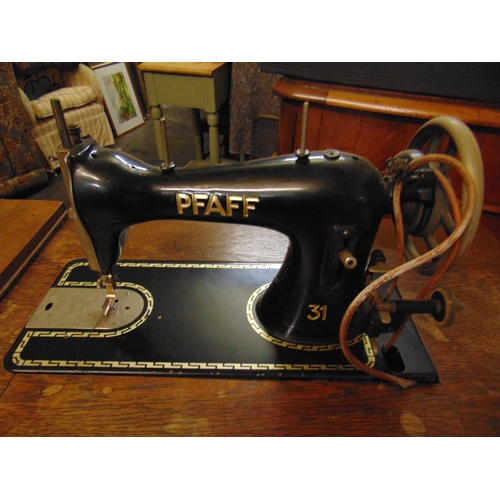 477 - Pfaff treadle sewing machine.