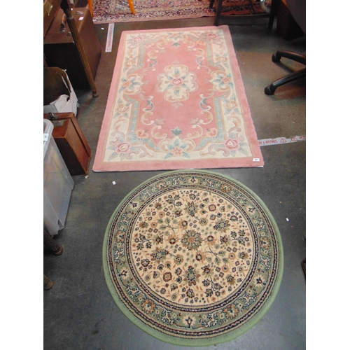 64 - Modern Chinese pink ground rug, 59 x 36