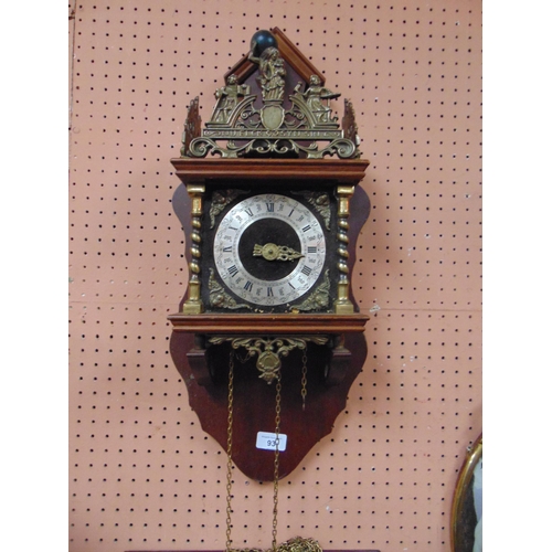 93 - Reproduction 'Atlas' wall clock, lacking weights.