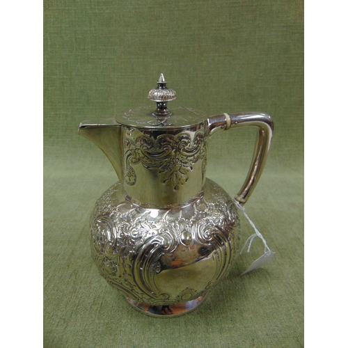 123 - Good plated hot water jug, of globular form and having moulded  decoration. 8