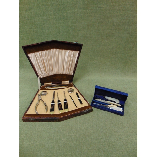 127 - Cased vintage manicure set, and one other. (2).