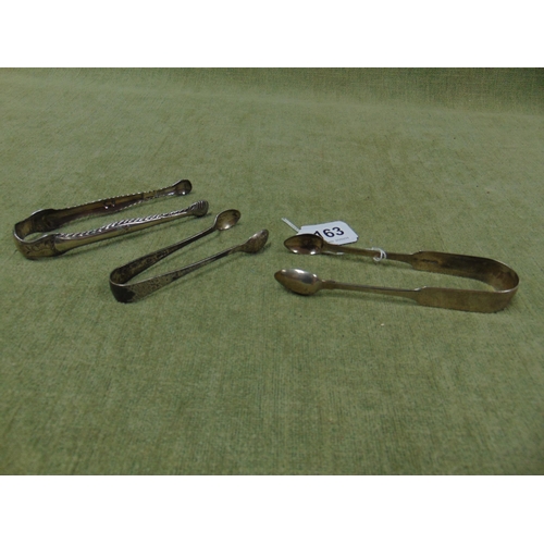 163 - Pair of silver sugar tongs, maker Owen Fielding, Exeter 1823, and two other pairs. 3.4 ozt inc.