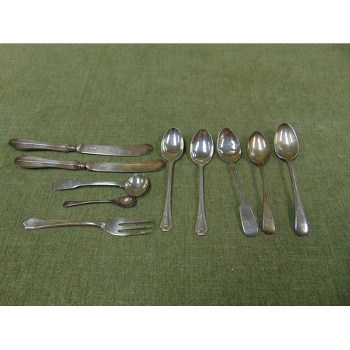 165 - Two silver handled butter knives and a collection of silver spoons, etc. 5.7 ozt inc.