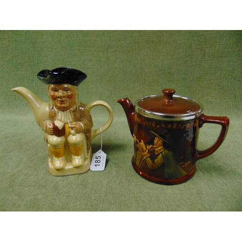 185 - Royal Doulton silver mounted teapot, together with a Woods Toby jug. (2).