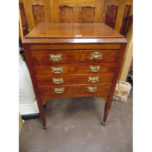 203 - Late Edwardian mahogany chest of four long drawers with brass escutcheons and handles, on tapered su... 