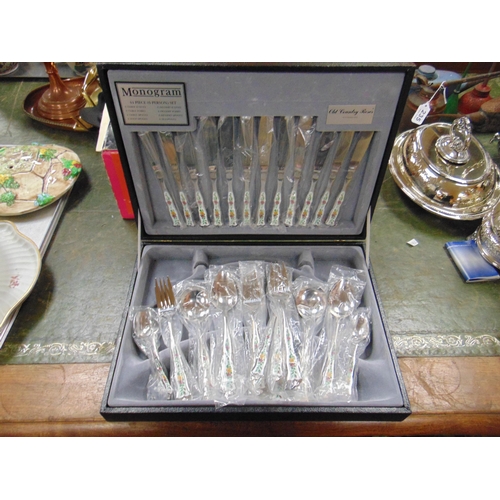 232 - Cased Monogrammed 44 piece (approx) Old Country Roses pattern canteen of cutlery.