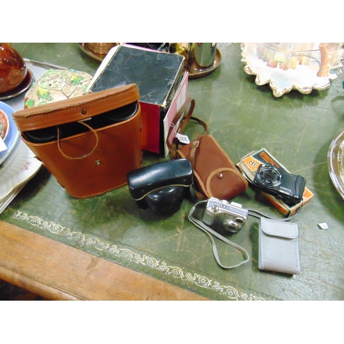 233 - Cased pair of Wake Filed  10 x 50 binoculars, boxed Rolls razor, camera and one other.