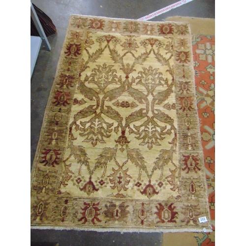 262 - Yellow and red ground rug, having all over floral pattern.