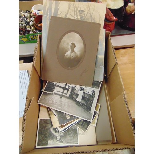 271 - Quantity of antique and later photographs.