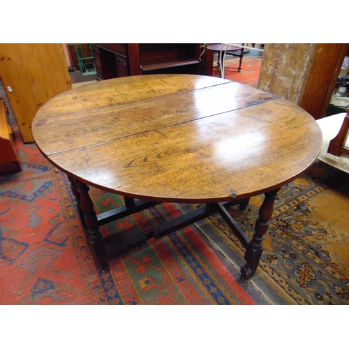 290 - Antique oak gateleg table, drop leaves, end drawer on turned supports and stretchers. 28 x 43 x 16