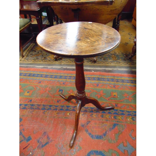 291 - 19th century oak tripod table, circular top, baluster turned column and on downswept supports, 26