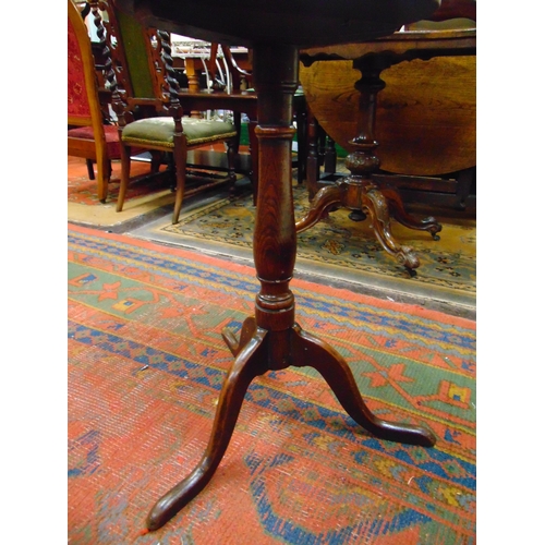 291 - 19th century oak tripod table, circular top, baluster turned column and on downswept supports, 26