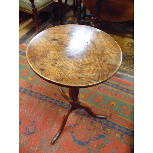 291 - 19th century oak tripod table, circular top, baluster turned column and on downswept supports, 26