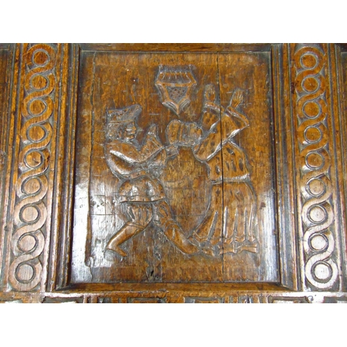 302 - Antique oak coffer, having all over carved decoration, lift up triple panel lid, further panels to f... 