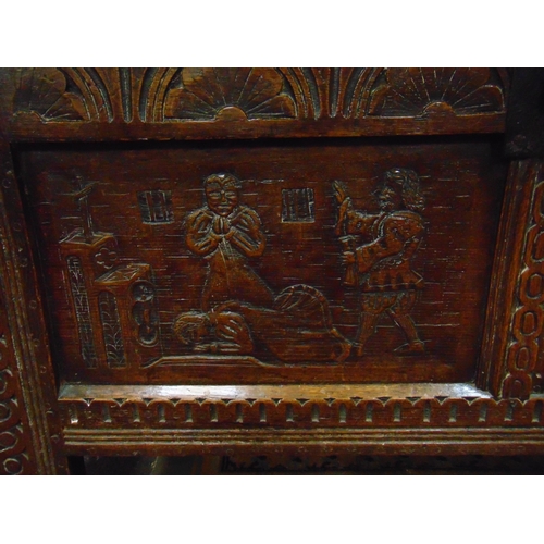 302 - Antique oak coffer, having all over carved decoration, lift up triple panel lid, further panels to f... 