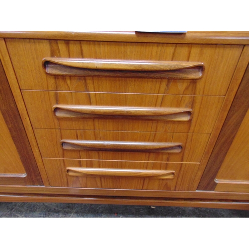 332 - G-Plan 'Fresco' teak sideboard, having four central drawers flanked by pair of cupboard doors to eit... 