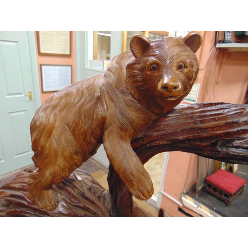 345 - Black Forest type wooden carved figure group, modelled as a bear and three cubs. 61