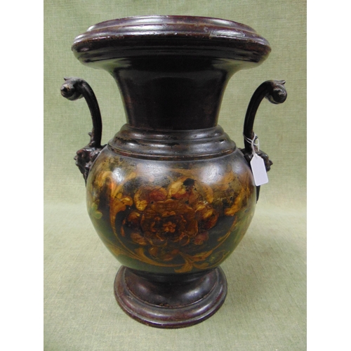 52 - Antique toleware two handled vase, set on footed base, 15.5