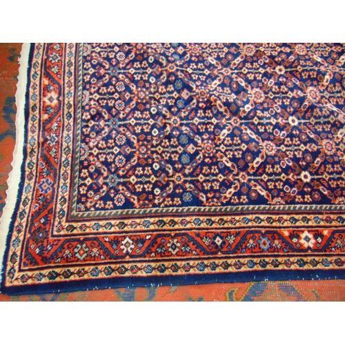 6 - Persian blue ground rug, having all over floral pattern. 80 x 54