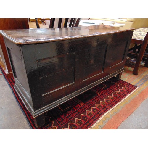 297 - Small antique oak coffer, lift up top, triple panel front and on stile supports. 23 x 43 x 16