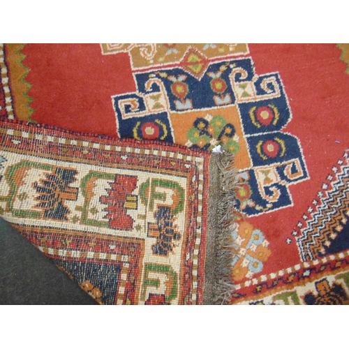 120 - Multi coloured Persian rug, having geometric design. 84 x 66