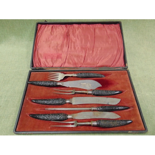 157 - Cased six piece silver bezzeled carving set.