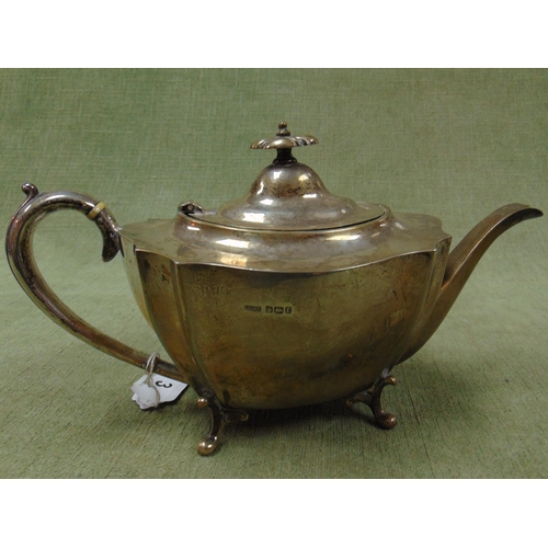 3 - Silver teapot, having loop handle and on pad feet, maker Maple & Co Sheffield 1909, 19.4 ozt.