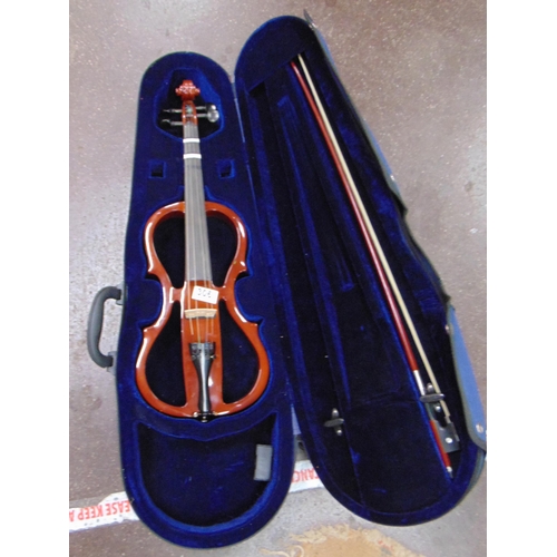 Cased unusual modern violin and bow.